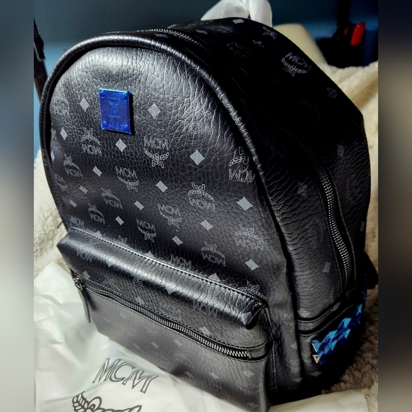 MCM Other - MCM stark Studded Backpack Nwt Still Has Blue  Protective Film Never Used